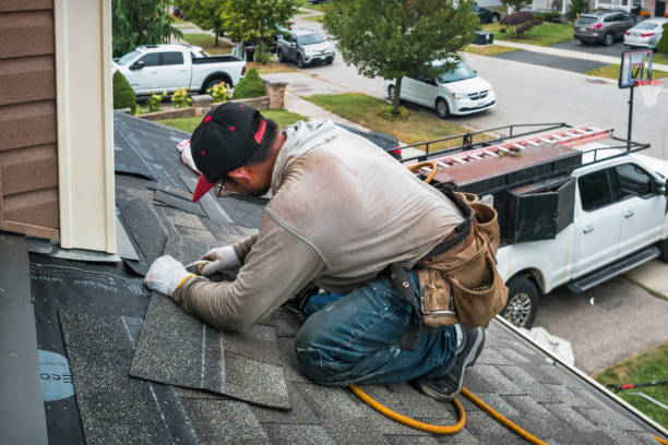 Professional Roofing technician working in Botsford, CT
